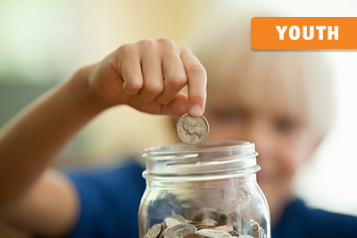 Boy with jar of money